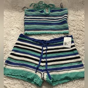 Brand new with tags great as a swim cover up